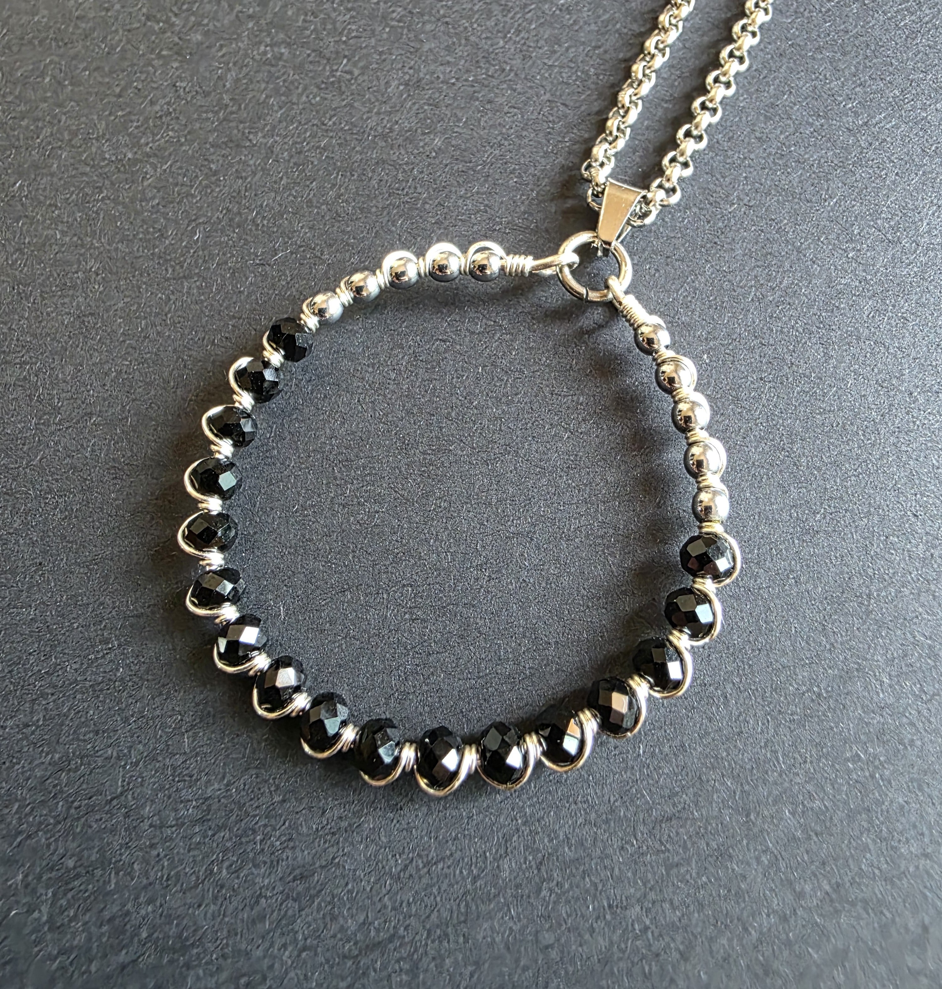 Black Ouro Charm