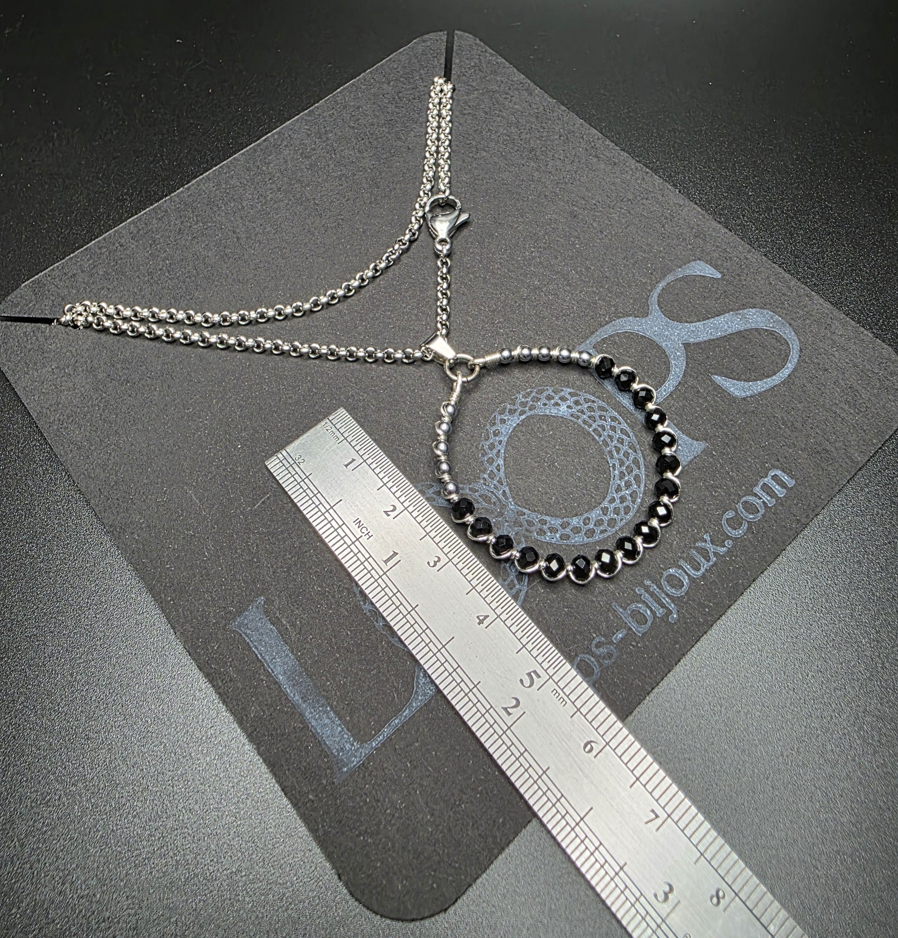 Black Ouro Charm